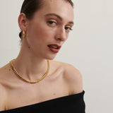 Model wears Gold Cube Chain Necklace with Anna Rossi Thick Gold Hoops. (6695455260753)