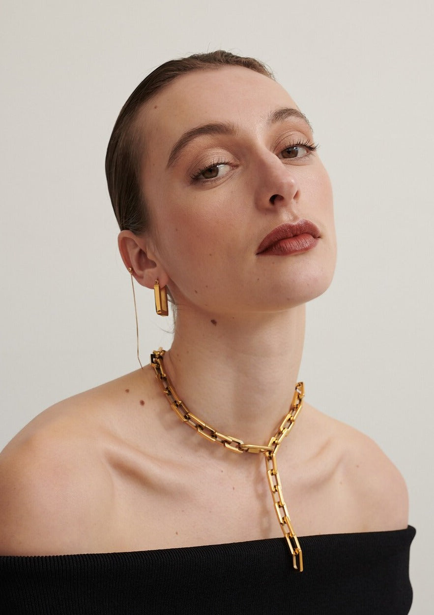 Model wears Gold Lock-It Up Chain Necklace with Gold Rectangle Hoops Earrings and Box Chain Stud Earring (6695454507089)