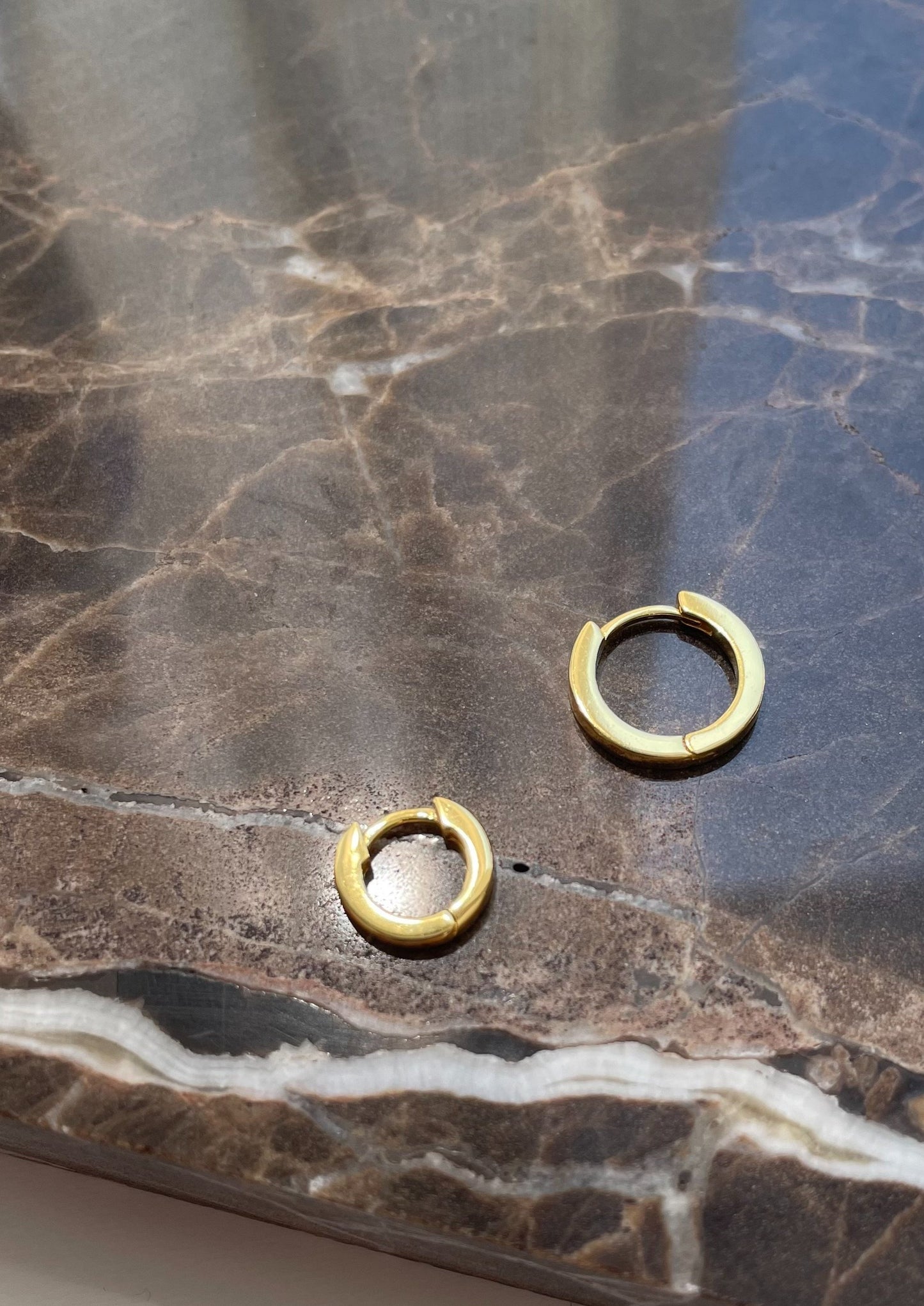 Featured: The Gold Huggie earrings in Size Small and Medium (6695458373713)